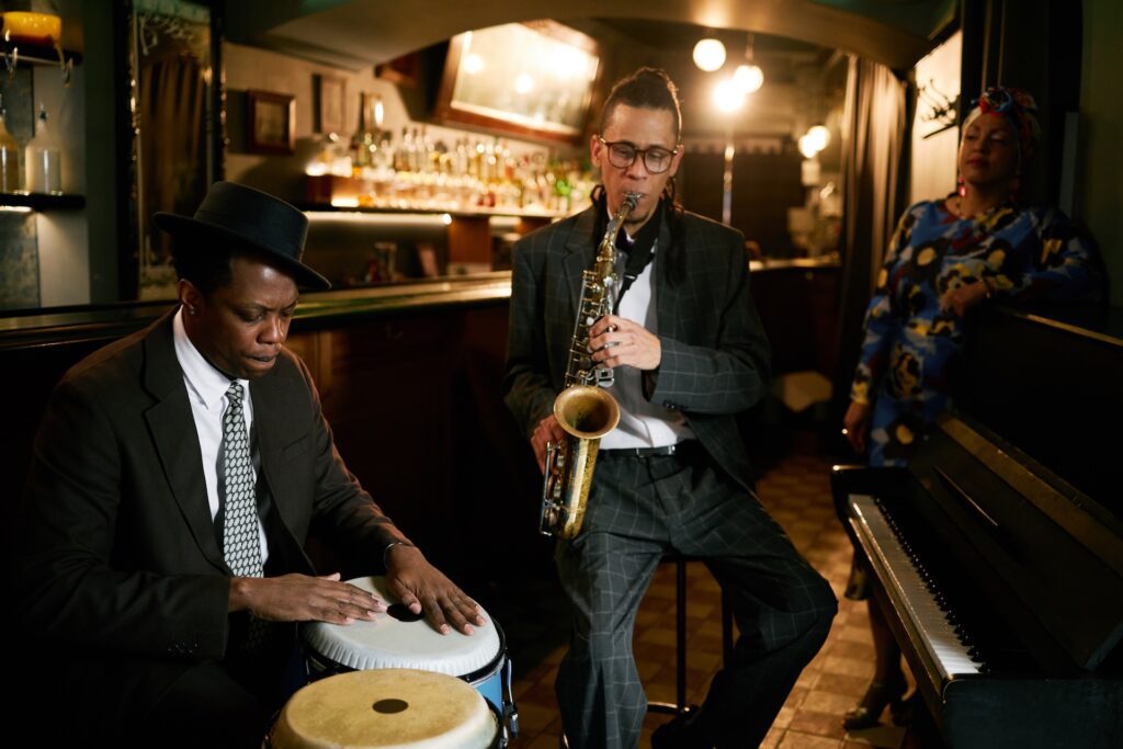 Perfect Day in New Orleans: Start Your Morning at Gallier’s 5 Musicians playing saxophone and conga drums in New Orleans