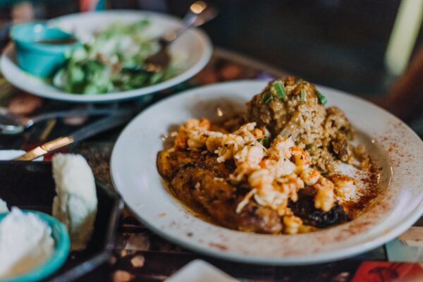 new orleans style food on a plate black cat cat 2024 11 29 00 52 17 utc 1 - Cajun vs Creole, Creole Food, Creole History, Louisiana Food, New Orleans Cuisine, Southern Cooking