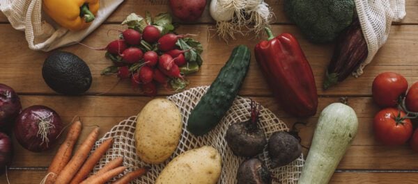 still life of fresh vegetables with cloth bags on 2025 01 09 18 34 51 utc - Cajun vs Creole, Creole Cuisine, Creole Trinity, Gallier’s Oyster Bar, Gallier’s Restaurant, Gumbo Base, Louisiana Cooking, New Orleans Food, Onion Bell Pepper Celery, Southern Food Culture