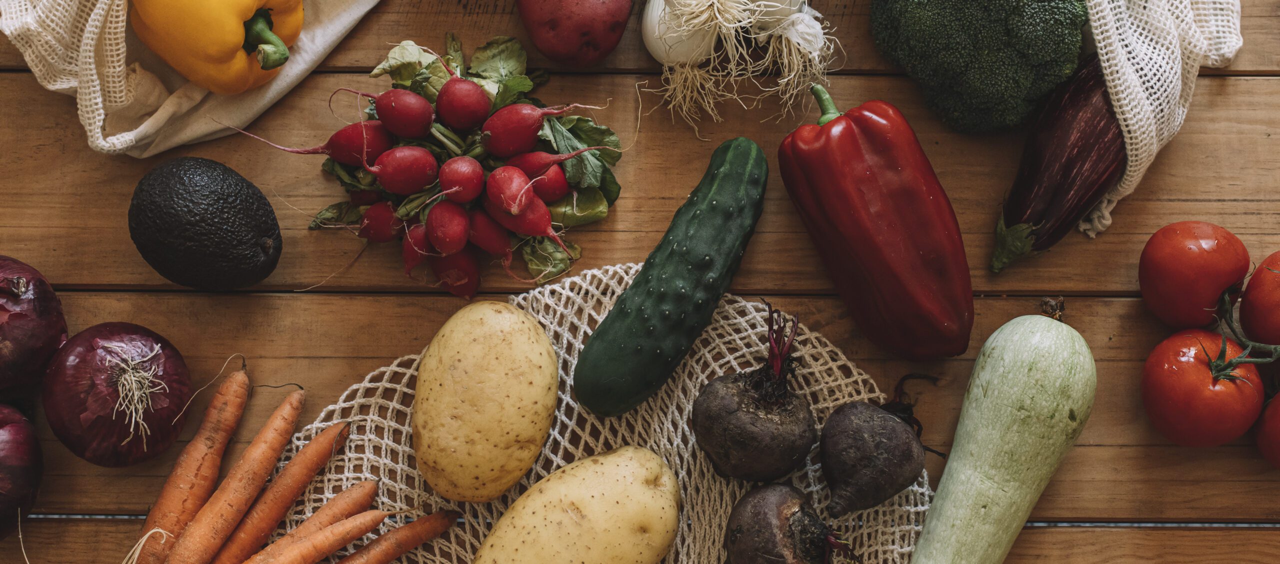 The Creole Trinity: Onion, Bell Pepper & Celery in Every Bite 1 still life of fresh vegetables with cloth bags on 2025 01 09 18 34 51 utc scaled - Creole Cuisine & Culture
