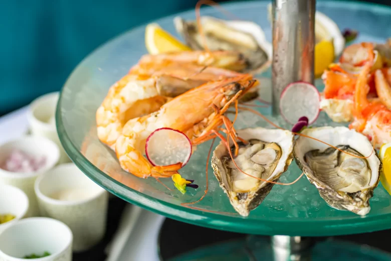 Seafood platter with shrimp, oysters, and crab legs