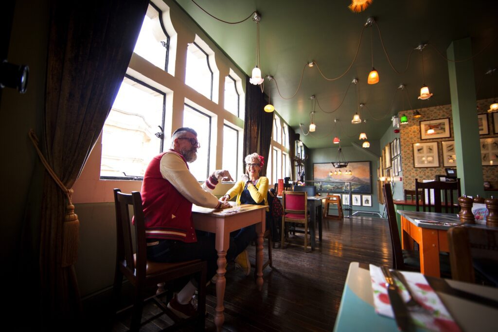 Guests enjoying a quiet, modern dining experience in New Orleans CBD