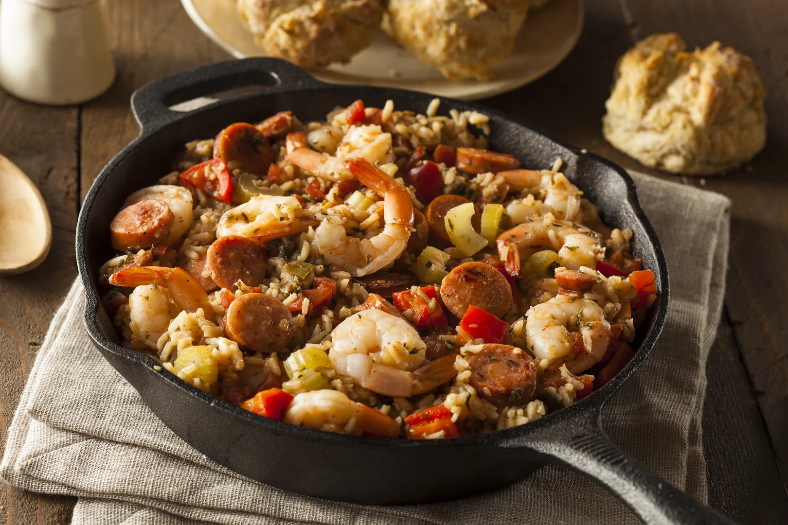Homemade Cajun jambalaya with shrimp and sausage in a cast iron skillet